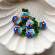 Cuenta pez de vidrio 19x13 mm - Rayas - Azul - Naranja - Verde x1