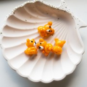 Cuenta osito de vidrio 19x14 mm - Naranja jaspeado x1