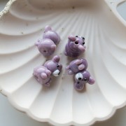 Cuenta osito de vidrio opaco 19x14 mm - Violeta jaspeado x1