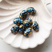Cuenta pez cerámica 18x14 mm - Azul oscuro - Naranja x1