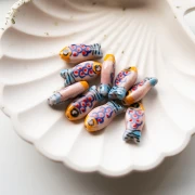 Cuenta pez de cerámica 21x10 mm - Rosa - Naranja - Azul x1