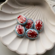 Cuenta cerámica ovalada 21x16,5 mm - Motivo langosta - Blanco - Rojo x1