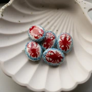 Cuenta cerámica ovalada 21x16,5 mm - Motivo langosta - Blanco - Rojo x1