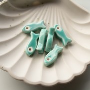 Colgante Pez de Cerámica 25x10 mm - Turquesa x1