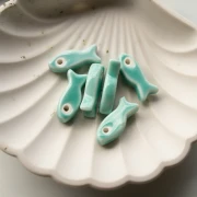 Colgante Pez de Cerámica 25x10 mm - Turquesa x1