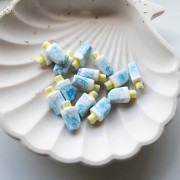 Cuenta de cerámica Ice 15x8 mm - Azul - Blanca x1