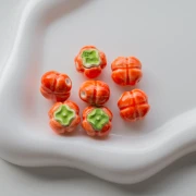 Cuenta de cerámica tomate 16 mm - Naranja - Verde x1