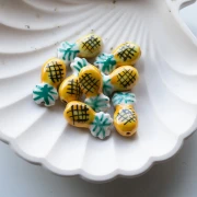 22x11 mm Cuenta piña de cerámica - Amarillo - Verde x1