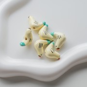 Cuenta de cerámica pájaro 15x21 mm - Beige - Turquesa x1