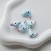 Cuenta de cerámica pájaro 15x21 mm - Azul cielo - Rosa x1
