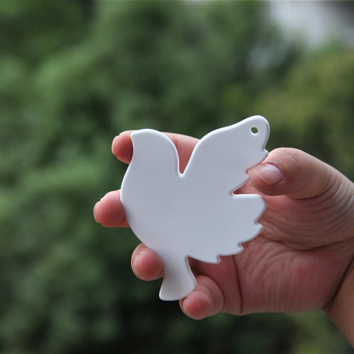 Molde de silicona para hacer un colgante con forma de paloma de 10 x 7,5 cm - Transparente x1