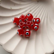 Cuenta cubo resina 8 mm - motivo ojo en relieve - Rojo - Blanco - Azul x1