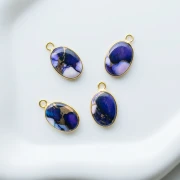 Dije ovalado de 18 x 11 mm de piedra preciosa - Turquesa Oyster Violet x1