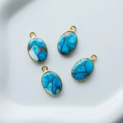 Dije ovalado de 18 x 11 mm de piedra preciosa - Turquesa Oyster Azul x1