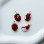 Dije ovalado de 18 x 11 mm de piedra preciosa - Turquesa Oyster Rouge x1