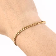 Cadena de eslabones figaro alternados (1x3) de 3,8 mm - Acero inoxidable 316L dorado x 50 cm