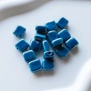 Cuenta cuadrada de cerámica de 10 mm - Azul cielo x1