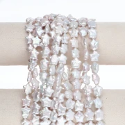 Cuenta de agua dulce con forma de estrella irregular, 13 x 12 mm - Blanca x1
