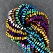 Mini-Hematites arandelas facetadas 3 mm Light Green Metallic x40 cm