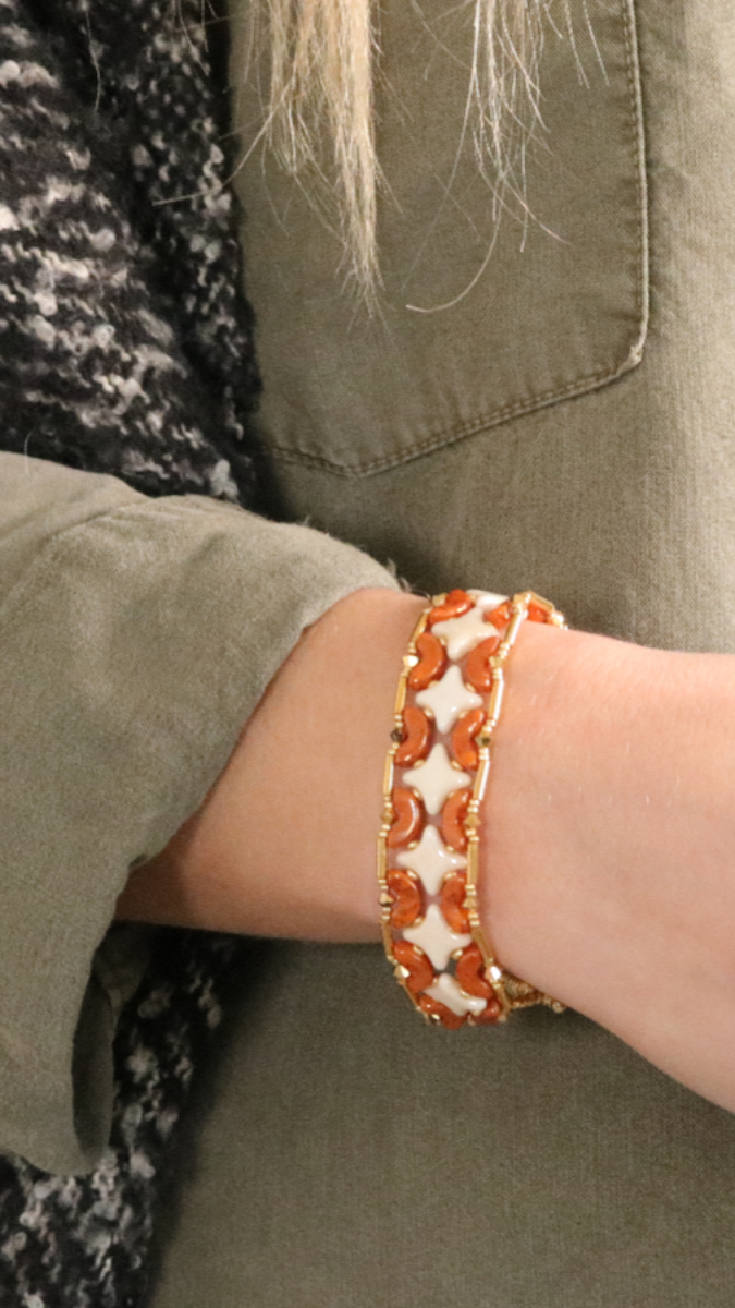 Esquema Elegante pulsera de fiesta con cuentas de estrellas y arcos de Puca