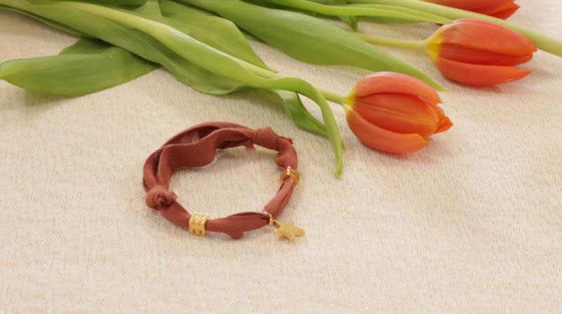 Pulsera deslizante con colgante de estrella dorada