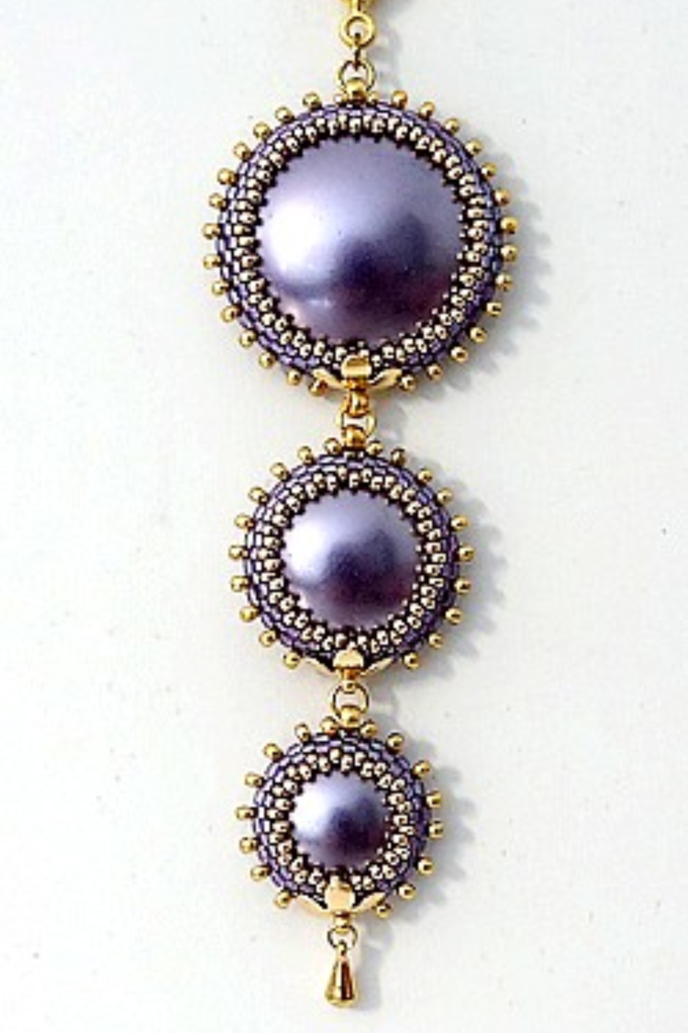 Esquema Colgante Takamata con cabujones de Puca engastados con cuentas de semillas Miyuki Esquema Colgante Takamata con cabujones de Puca engastados con cuentas de semillas Miyuki