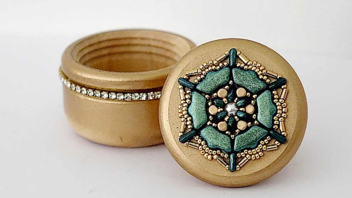 Caja secreta Jodie con cuentas de vidrio Delos, Piros y Minos de Puca