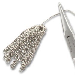 ¿Cómo utilizar una concha para hacer un pompón con cadenas? : Paso 8