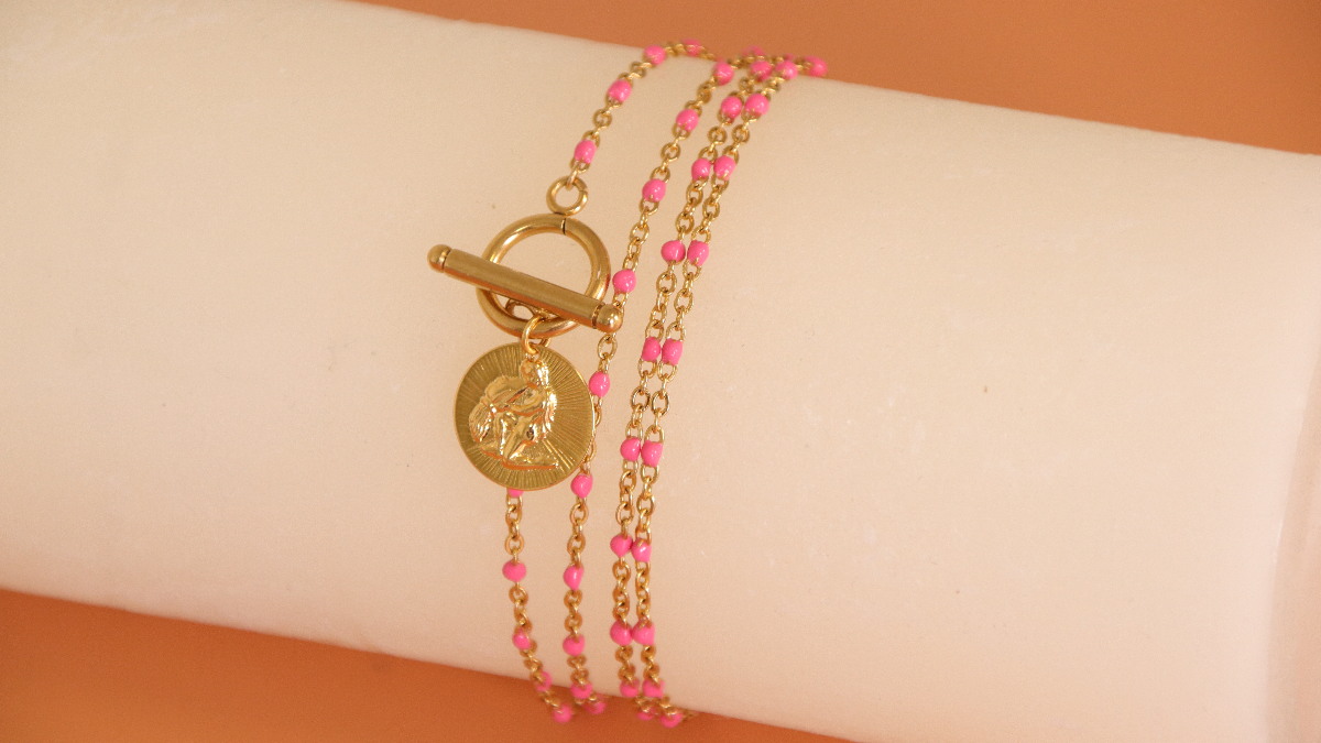 Esquema Joya 3 en 1 con cadena de acero inoxidable, cuentas de resina fucsia y charm de astro signo