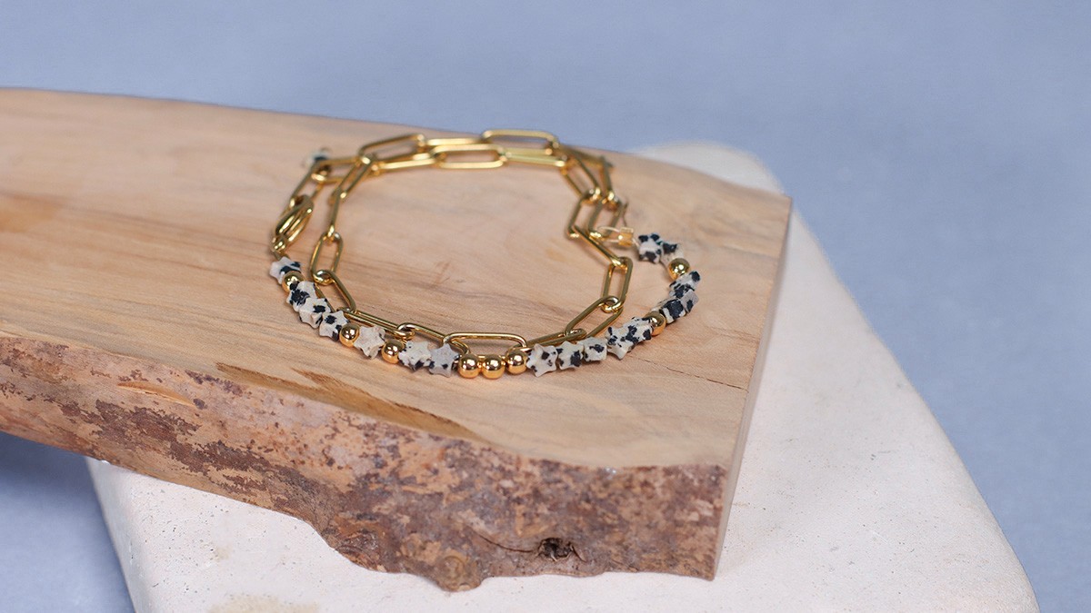Esquema Pulsera estrella de jaspe dálmata con cadena rectangular de acero inoxidable