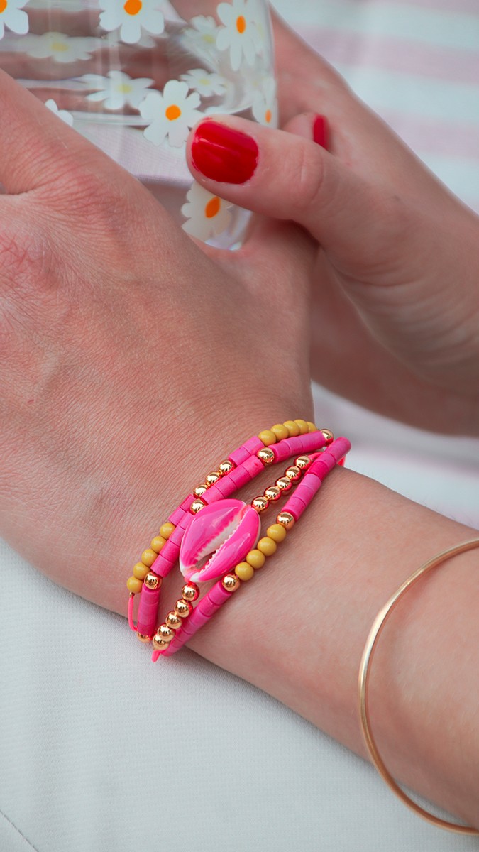 Esquema Pulsera fluorescente de varias filas con cauri y cuentas Esquema Pulsera fluorescente de varias filas con cauri y cuentas