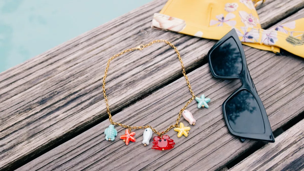 Esquema Collar Charms Ocean de acero inoxidable dorado Esquema Collar Charms Ocean de acero inoxidable dorado