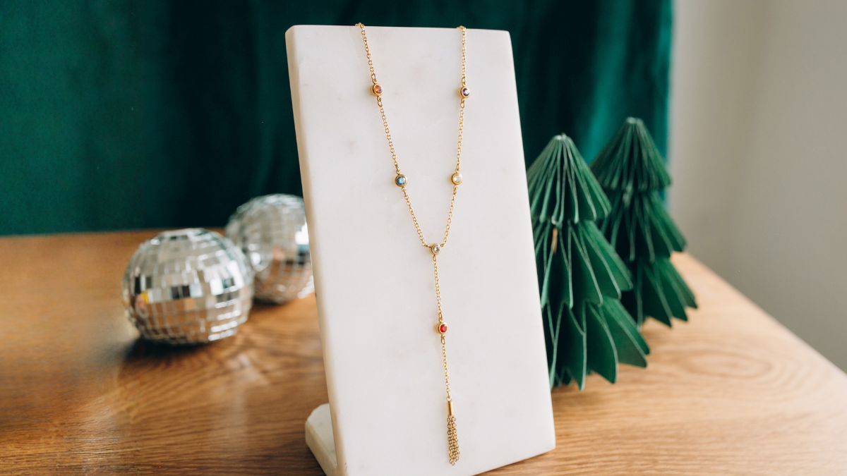 Collier cascade zircons et pompon en acier inoxydable