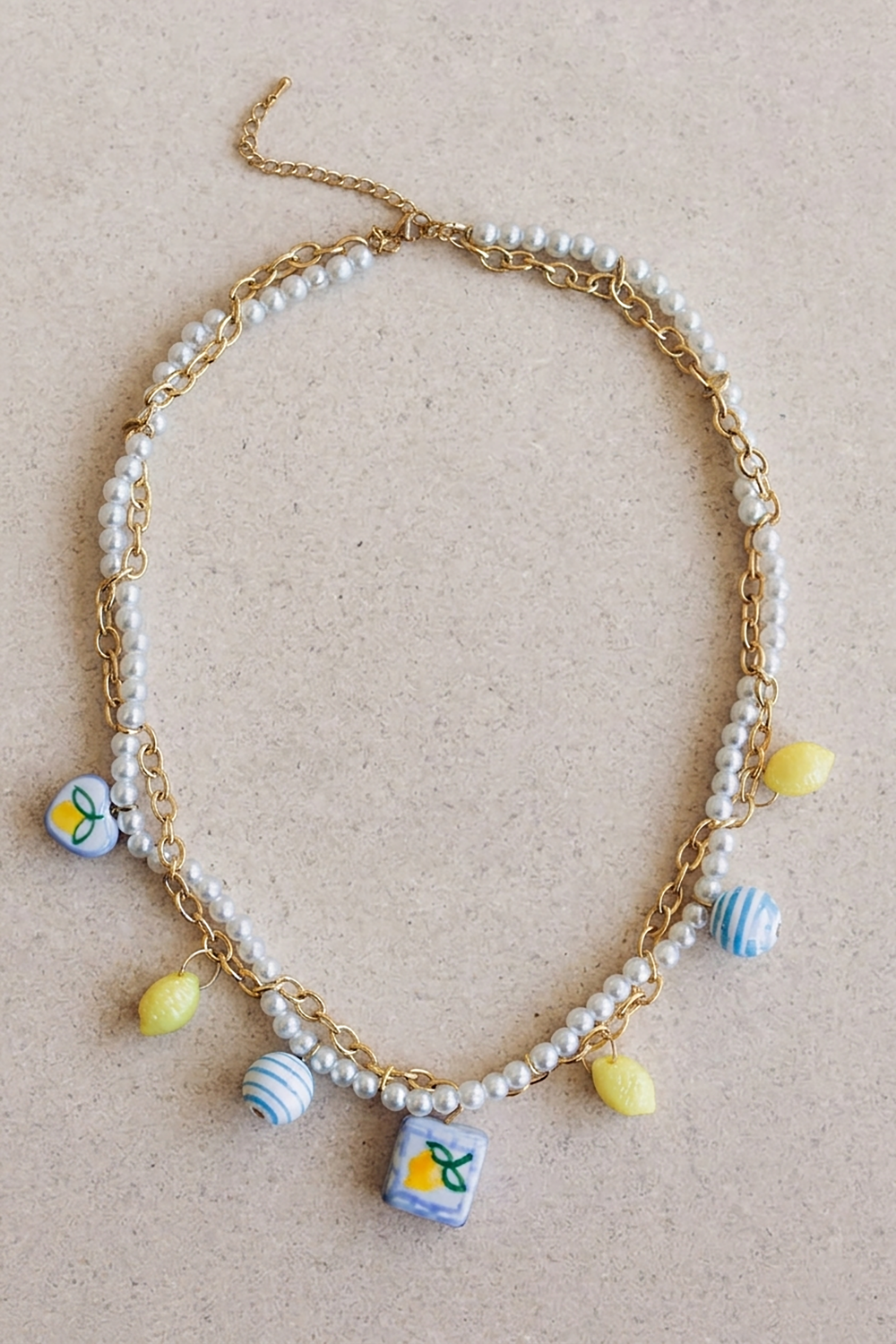 Esquema Collar de limones de acero inoxidable, con imitaciones de perlas y cuentas de cerámica